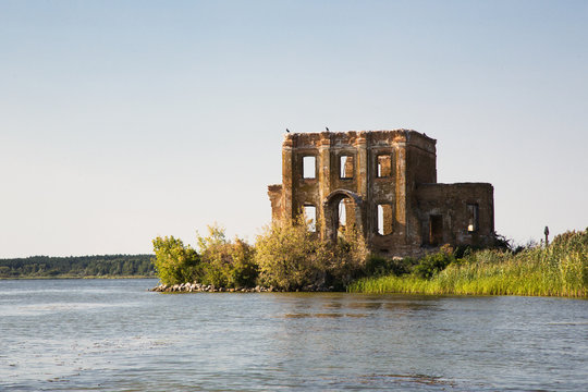 The ruins of the church of St. Elijah in the village of Tsybli, Ukraine. Appearance from the river.