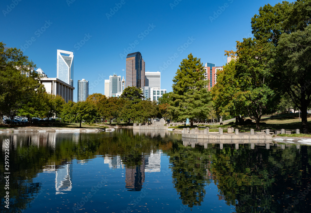 Wall mural Charlotte, North Carolina city skyline in early autumn with blue skies