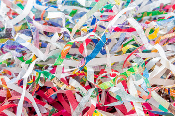 Closeup shredded paper texture and reuse colorful color paper scrap of document .Selective focus...