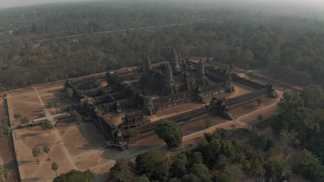 Drone Timelapse Angkor Wat Temple in Cambodia sunrise fog drone flight