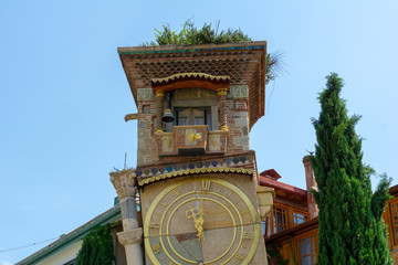Fototapeta na wymiar Clock on Gabriadze Theater in Tbilisi