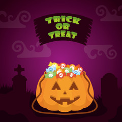 halloween dark scene with pumpkin and candies