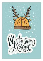 Winter vector card. Cute hat with deer horns. Hand Drawn Merry Christmas Cartoon Doodle art with lettering quote - Up to snow good.