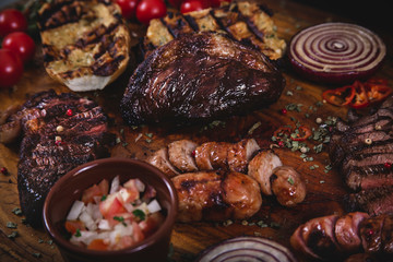 Assorted meat on wood