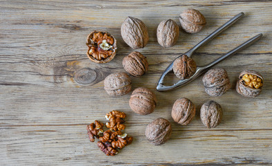 Walnuts closeup on a wooden background, selective focus