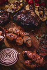 Assorted meat on wood