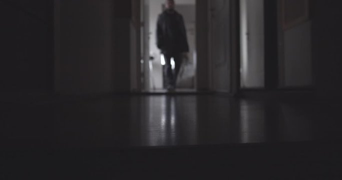CSI. A man walks through the corridor, killer, assasin.