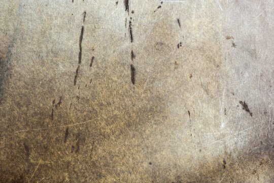 texture of soiled scratched textolite or plastic, close-up abstract background