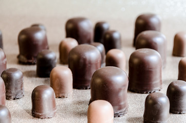 Black chocolate marshmallows in a group