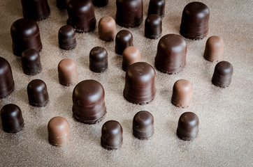Black chocolate marshmallows in a group