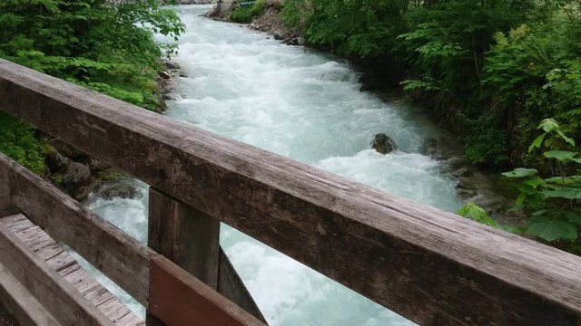 Bridge over wild water stream in Garmisch-Partenkirchen / Germany