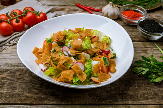 fatouche salad on wooden table