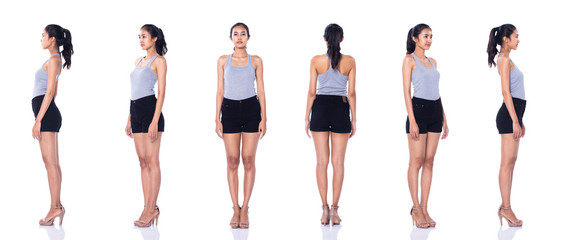 Fashion Young tan 20s Asian Woman gray vast dress short black pants high heels shoes stand posing...