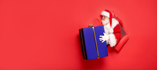 Santa Claus with the big gift box.