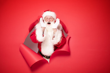 Santa Claus on the red background.