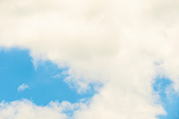 Natural light from the sun with blue sky and white clouds.