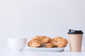 Different hot coffee menu and croissant isolated on white background.White and disposable coffee cup for customer in the coffee shop.Different drinking menu concept.