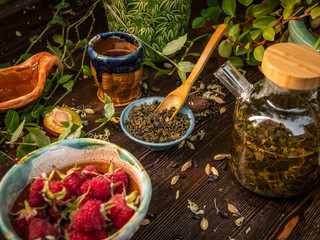 Preparation of the tea ceremony, tea in the bowl. Handmade cups
