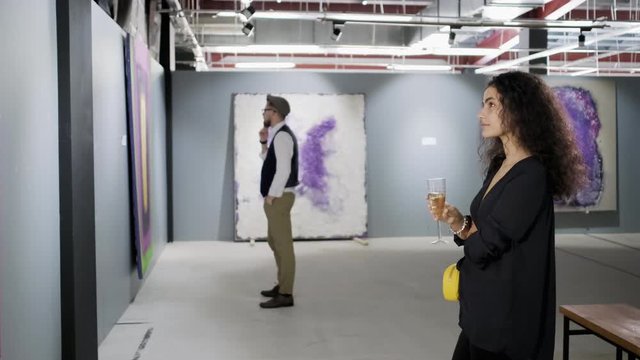 Woman trying to understand the concept of painting