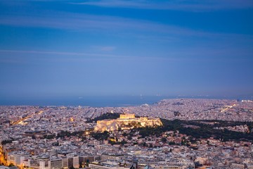 Naklejka premium cityscape of Athens in early morning with the Acropolis seen from Lycabettus Hill, the highest point in the city