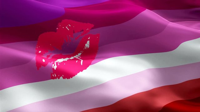 Rainbow Lipstick Lesbian Pride Flag video waving in wind. new Lesbian Lipstick Flag background. Rainbow Pride LGBT Flag Looping Closeup 1080p Full HD 1920X1080 footage.Rainbow colors LGBT Labrys right