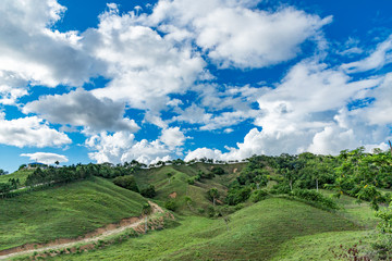 Mountains view, tropical landscape, palm trees, sky scape, sunlight through clouds, Dominican Republic 