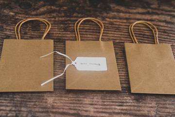 shopping and marketing techniques, group of price tags with Sales Strategy text on them on top of shopping bags