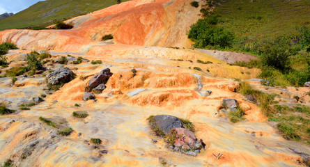Mineral red water from the mineral springs in Gudauri in the Kazbegi District. Sources of mineral water with fossils Mtskheta Mtianeti Region, Georgia.