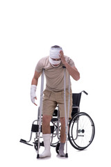 Naklejka premium Injured man in wheel-chair isolated on white