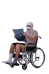 Obraz na płótnie Canvas Injured man in wheel-chair isolated on white