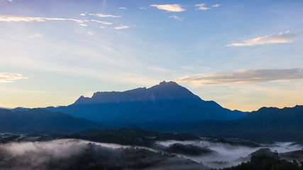 Amazing Beautiful Nature landscape view of Sunrise with  nature misty foggy and Mount Kinabalu, Sabah, Borneo