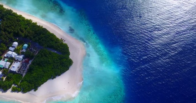 Aerial of perfect white sand beach, Coconut Plantation Tupai Heart Island In The South Pacific