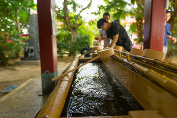 Water ladle in Naminoue Shrine in Naha, Okinawa, Japan.