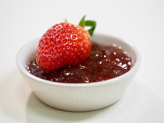 Fresh strawberries and strawberry jam