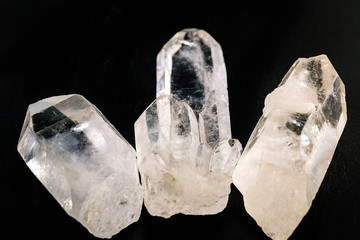 Quartz isolated on black background. Energizing stone, meditation. Spirituality concept