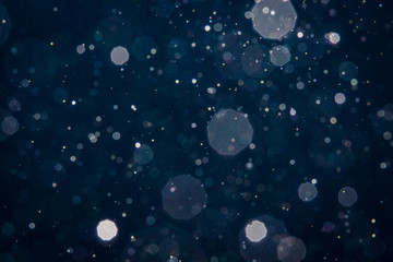Obraz na płótnie Canvas Abstract blue light blur bokeh circles