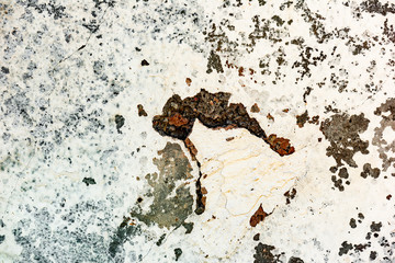 Texture of a concrete wall with cracks and scratches which can be used as a background