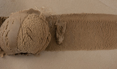 Fototapeta na wymiar Closeup scooping ice cream Chocolate, Top view Blank for design..