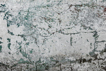 Obraz premium Texture of a concrete wall with cracks and scratches which can be used as a background