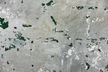 Texture of a concrete wall with cracks and scratches which can be used as a background