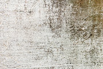Texture of a concrete wall with cracks and scratches which can be used as a background