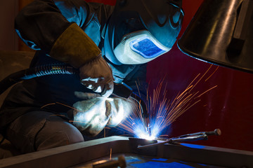 Industrial steel welder in factory welder, craftsman