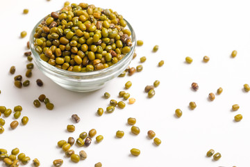 Green gram seed or mung beans in bowl on white background 