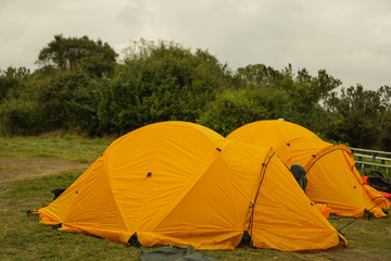 Camping spot on the mountain on the way up Kilimanjaro Mountain in Tanzania blue sky