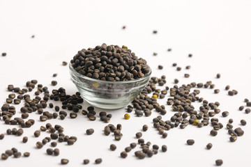 black gram seed or udad beans in bowl on white background 