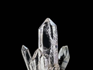 Macro photography of natural minerals from geological collection - clear quartz stone (rhinestone) on isolated black background. Zen meditation or relaxation concept. - obrazy, fototapety, plakaty