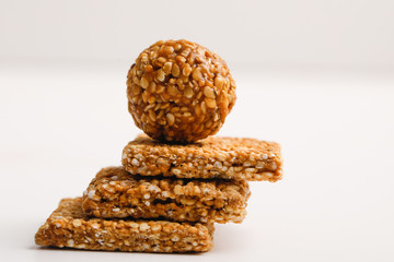 Indian sweet dish,Sesame seeds ball or called in hindi, til ke laddu on white background 