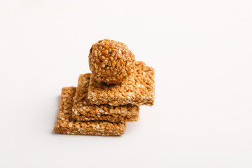Indian sweet dish,Sesame seeds ball or called in hindi, til ke laddu on white background 