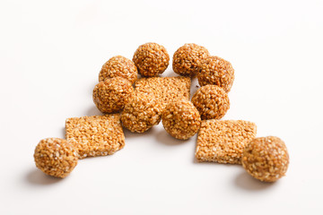 Indian sweet dish,Sesame seeds ball or called in hindi, til ke laddu on white background 