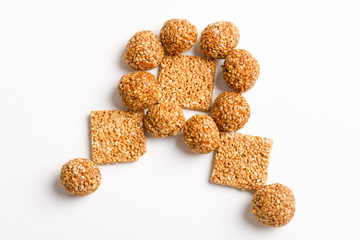 Indian sweet dish,Sesame seeds ball or called in hindi, til ke laddu on white background 